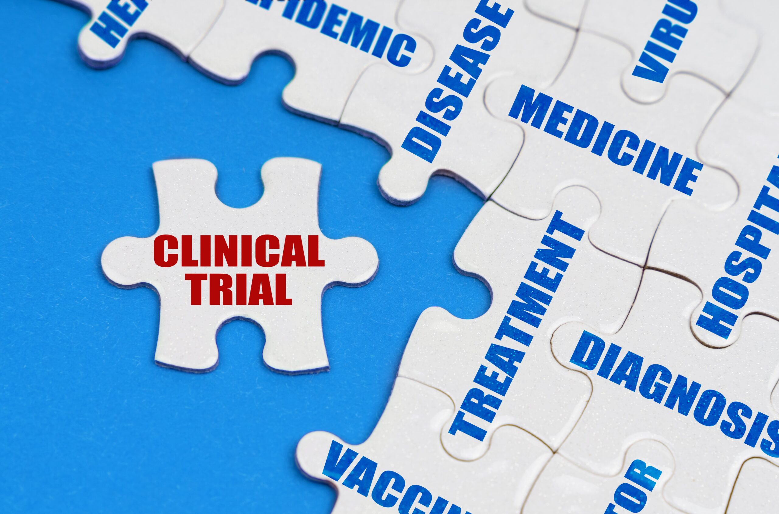 Puzzle pieces with medical terms like clincal trial